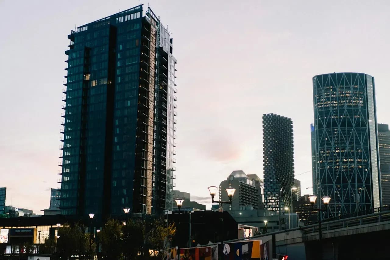 Rooftops and skyline of Calgary, Alberta — the area RooFix serves