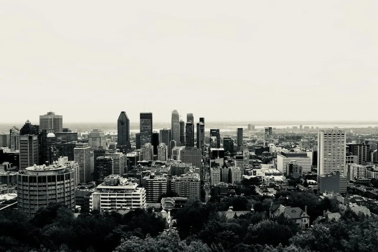 Rooftops and skyline of Montreal, Quebec — the area RooFix serves