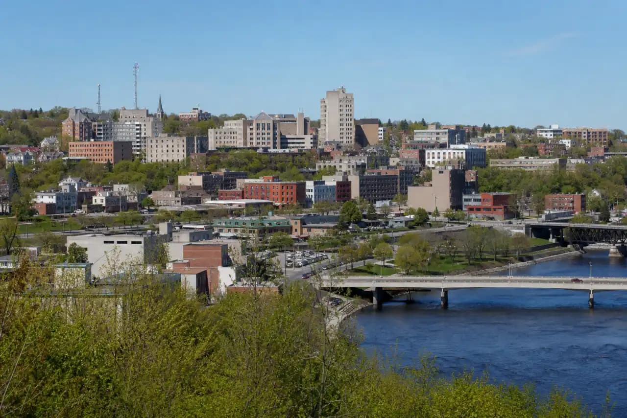 Rooftops and skyline of Sherbrooke, Quebec — the area RooFix serves