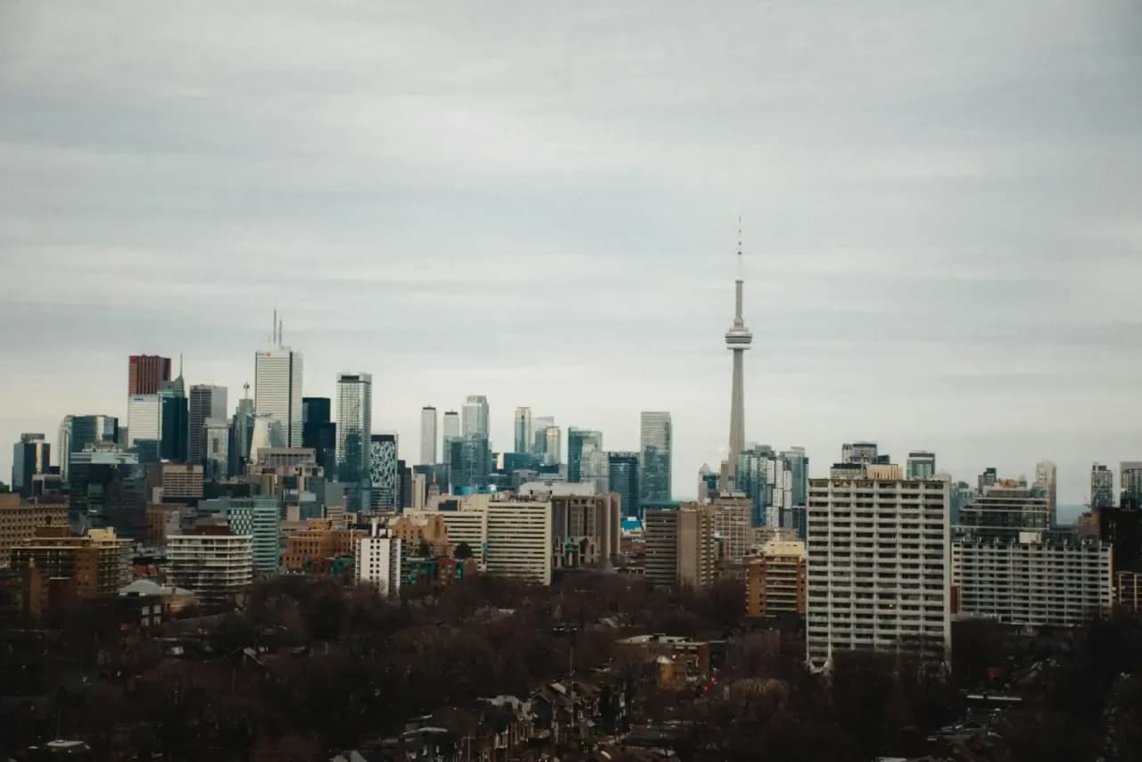Rooftops and skyline of Toronto, Ontario — the area RooFix serves
