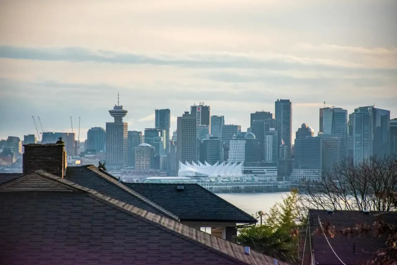 Rooftops and skyline of Vancouver, British Columbia — the area RooFix serves