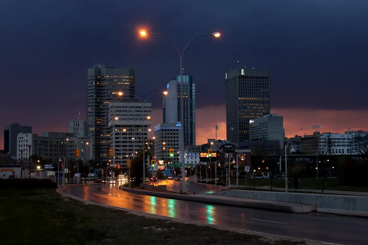 Rooftops and skyline of Winnipeg, Manitoba — the area RooFix serves